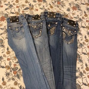 4 pairs of Miss Me girls boot cut jeans